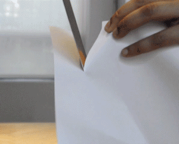 Sharp Knife Cutting Bond Paper GIF