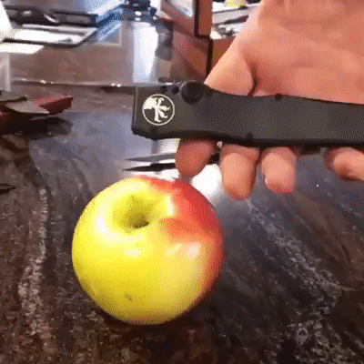 Sharp Knife Pointing Apple GIF