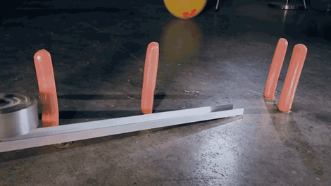 Sharp Spinning Metal Blade Cutting Candles GIF