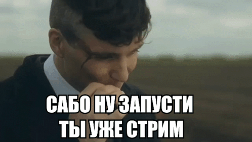 Shaved Head Man Hand to Mouth Foreign Caption