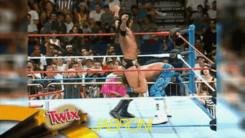 Shawn Michaels Throwing Razor Ramon Outside The Ring GIF