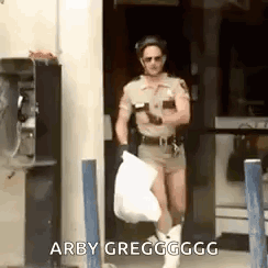 Sheriff Carrying Bag of Trash