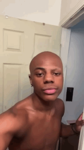 Shirtless Bald Man Standing GIF
