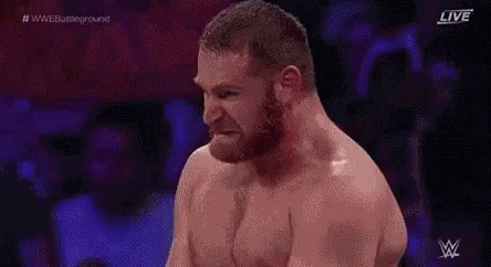 Shirtless Bearded Man in Wrestling Ring