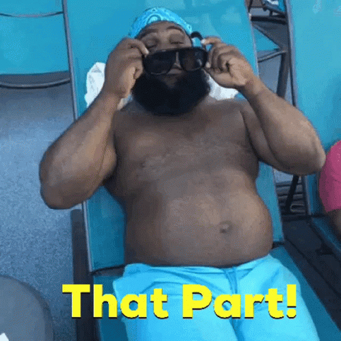 Shirtless Bearded Man Lying on Chair