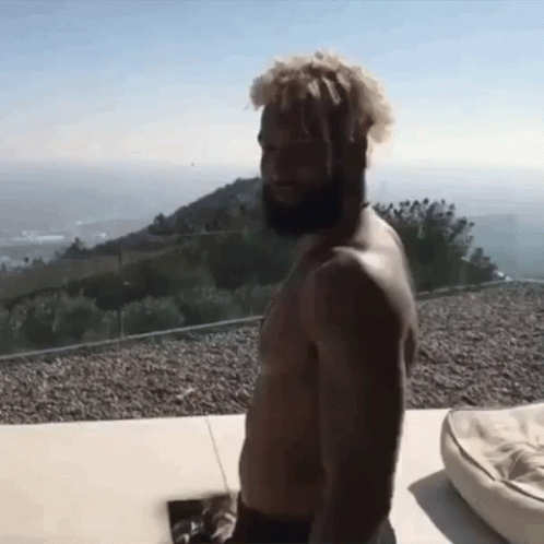 Shirtless Bearded Man With Ocean View