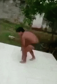 Shirtless Boy Slide While Dabbing GIF