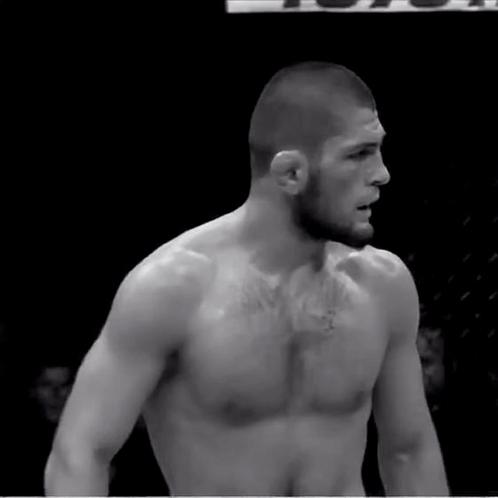 Shirtless Fighter With Toyota Sign GIF