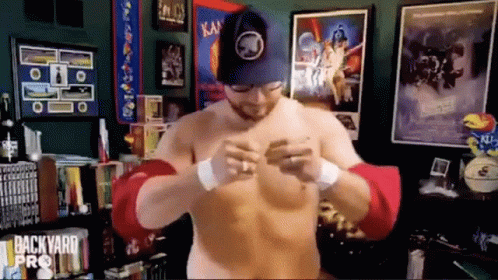 Shirtless Man At Backyard Pro Bookshelf GIF