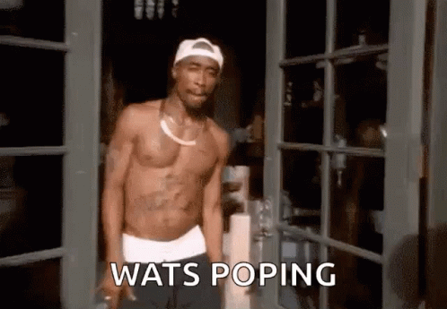 Shirtless Man at Wats Popping Door
