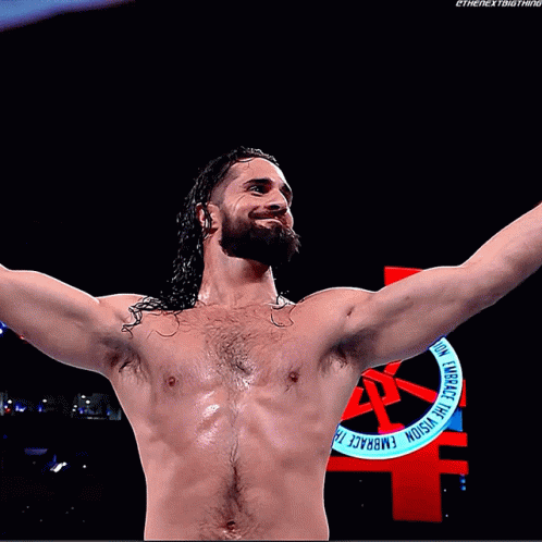 Shirtless Man Before Embrace the Vision Sign
