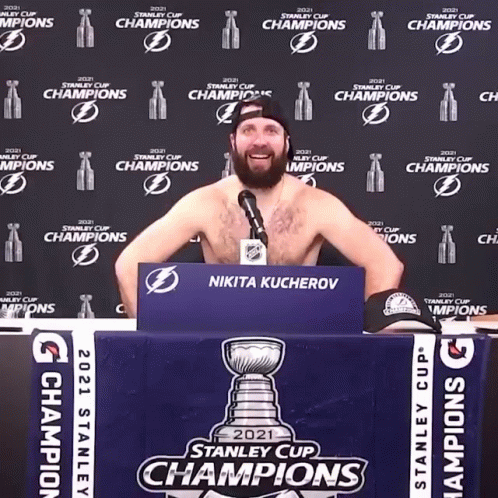 Shirtless Man Behind Stanley Cup