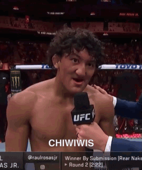 Shirtless Man Being Interviewed GIF