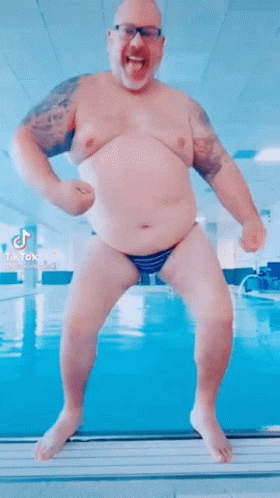 Shirtless Man Dancing By Pool GIF