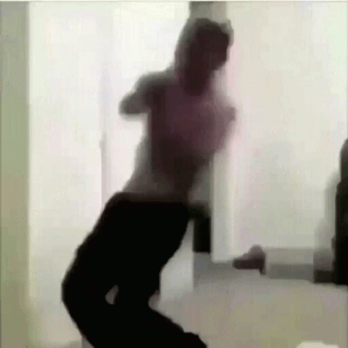 Shirtless Man Dancing In Front Of Mirror GIF