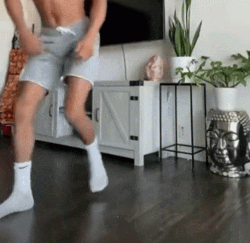 Shirtless Man Dancing In Living Room GIF