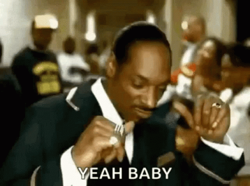 Shirtless Man Dancing in Orange Underwear
