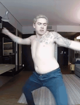 Shirtless Man Dancing with Arms Out