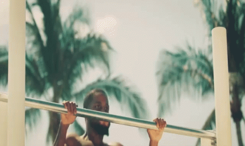 Shirtless Man Doing Pull Ups