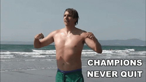 Shirtless Man Flexing Champions Never Quit