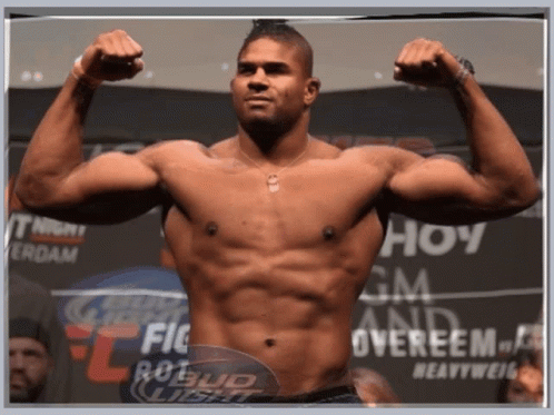 Shirtless Man Flexing Muscles GIF