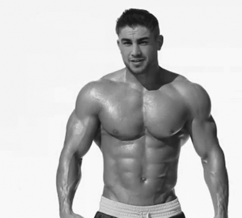 Shirtless Man Flexing Muscles GIF