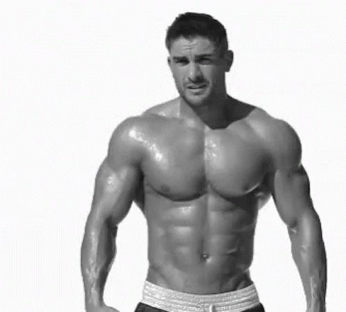 Shirtless Man Flexing Muscles GIF