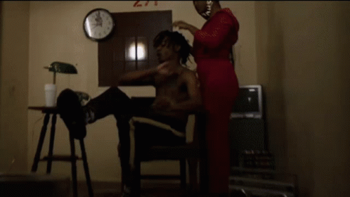 Shirtless Man Getting Hair Done by Woman, Room 271