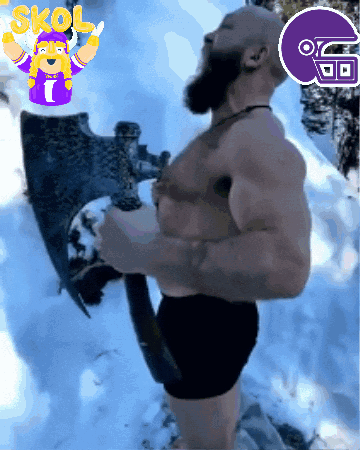 Shirtless Man Holding Axe In Snow Skol GIF