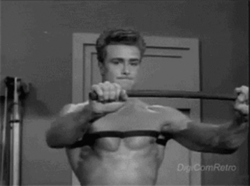 Shirtless Man Holding Barbell