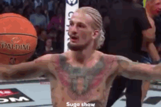 Shirtless Man Holding Basketball
