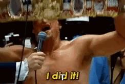 Shirtless Man Holding Microphone Saying I Did It
