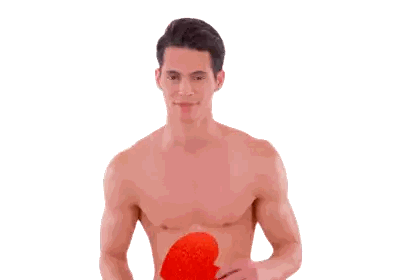 Shirtless Man Holding Red Object
