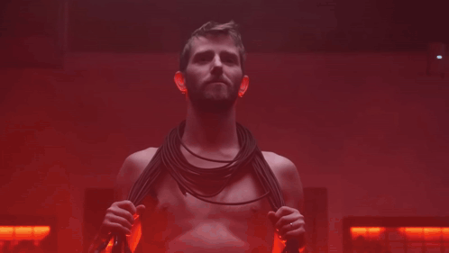 Shirtless Man Holding Rope