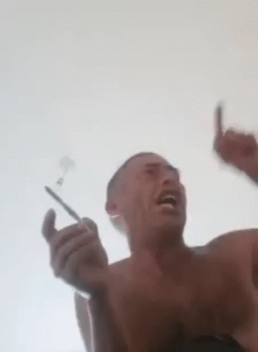 Shirtless Man Holding Toothbrush