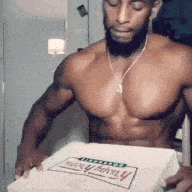 Shirtless Man Holding Very Hungry Box