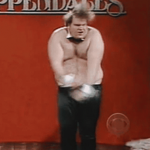 Shirtless Man in Bow Tie Dancing in Front of Philadelphia Sign