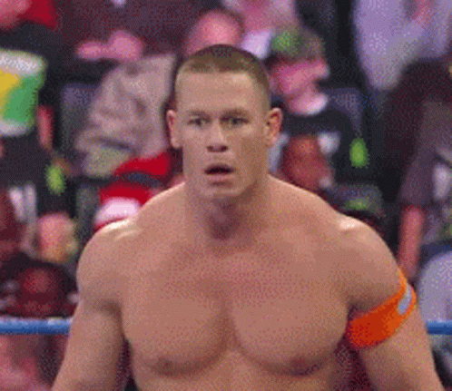 Shirtless Man In Boxing Ring With Crowd GIF