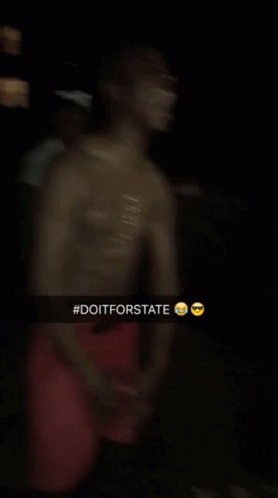 Shirtless Man In Crowd With #Doitforstate GIF