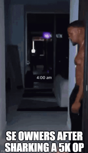 Shirtless Man in Dark Hallway se owners after sharking a 5k op