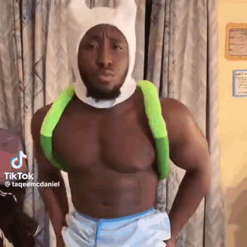 Shirtless Man In Finn Costume With Backpack GIF