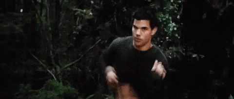 Shirtless Man in Forest