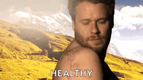 Shirtless Man in Front of Mountain with Healthy