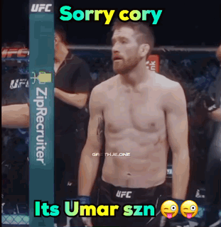 Shirtless Man in Front of UFC Sorry Cory Its Umar Szn Sign