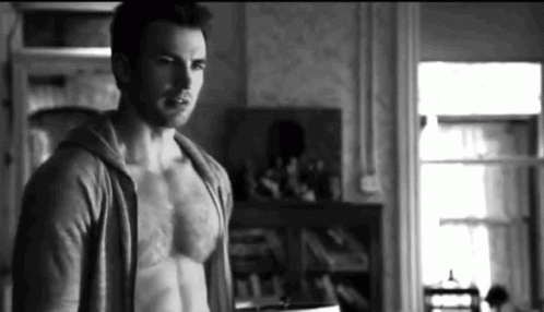 Shirtless Man in Hoodie Standing