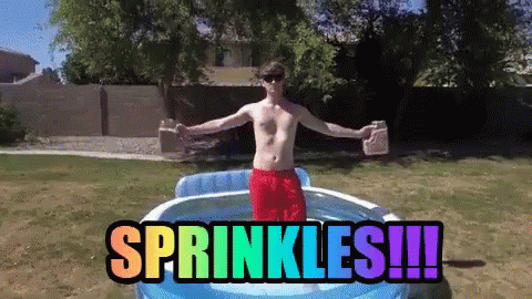 Shirtless Man in Inflatable Pool Saying Sprinkles
