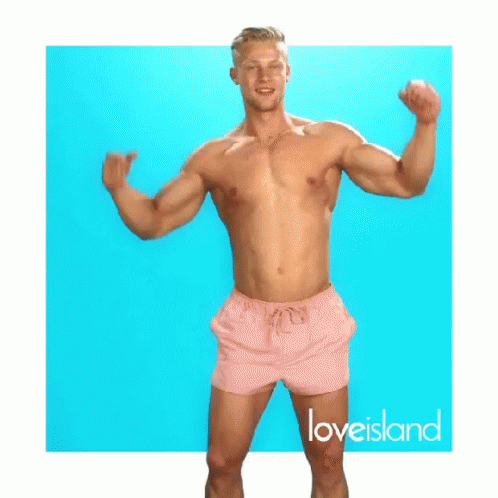 Shirtless Man in Pink Shorts Flexing Muscles on Blue