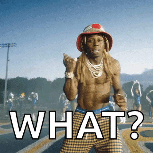 Shirtless Man in Plaid Shorts Red Hat Saying What