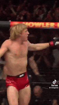 Shirtless Man in Red Shorts Boxing Ring Howler Sign