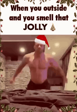 Shirtless Man In Santa Hat GIF